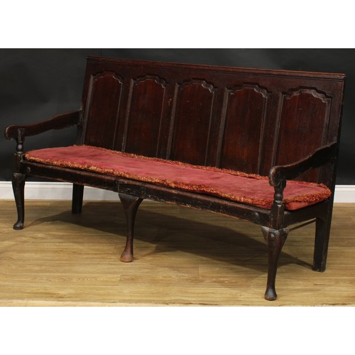 2007 - An 18th century oak settle, rectangular back with five arched raised and fielded panels, shaped arms... 