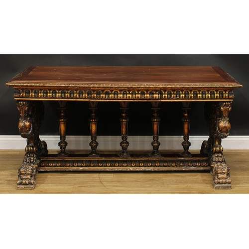 1614 - A 19th century Italian Renaissance Revival parcel-gilt walnut centre table, in the manner of Angiolo... 