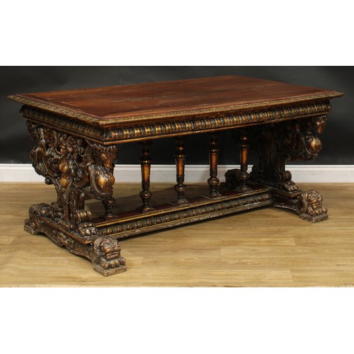 1614 - A 19th century Italian Renaissance Revival parcel-gilt walnut centre table, in the manner of Angiolo... 