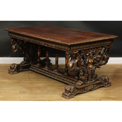 1614 - A 19th century Italian Renaissance Revival parcel-gilt walnut centre table, in the manner of Angiolo... 