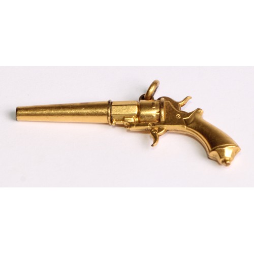 2244 - A late Victorian/Edwardian gold coloured metal novelty pocket watch key as a revolver, 5cm long