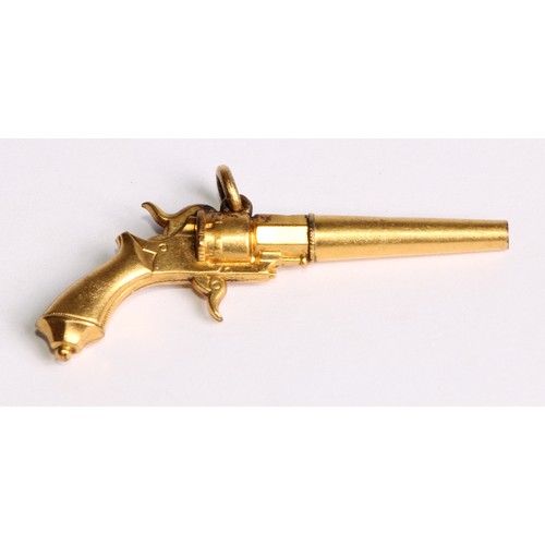 2244 - A late Victorian/Edwardian gold coloured metal novelty pocket watch key as a revolver, 5cm long