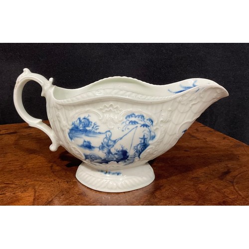 179 - A first period Worcester blue and white sauceboat, the whole press moulded and painted with Chinese ... 