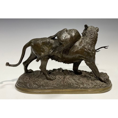 2702 - Christopher Fratin (1801-1864), a brown patinated bronze, Big Cat with Kill, standing on naturalisti... 