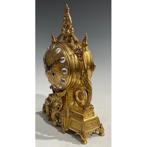 2406 - A 19th century Etruscan Revival ormolu mantel clock, the 14cm dial applied with enamel Roman numeral... 