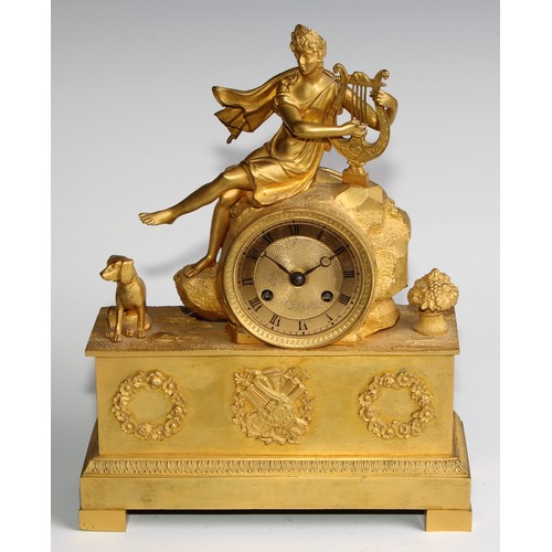 1752 - A French Empire ormolu mantle clock, the 7cm circular engine turned dial with Roman numerals, twin w... 