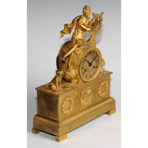 1752 - A French Empire ormolu mantle clock, the 7cm circular engine turned dial with Roman numerals, twin w... 