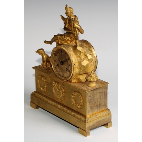 1752 - A French Empire ormolu mantle clock, the 7cm circular engine turned dial with Roman numerals, twin w... 