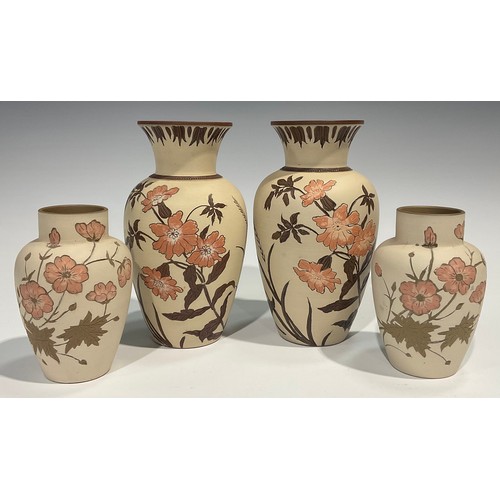 60 - A pair of Lovatts Langley Ware slender ovoid vases, decorated in sgraffito with salmon pink flowerin... 