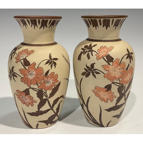60 - A pair of Lovatts Langley Ware slender ovoid vases, decorated in sgraffito with salmon pink flowerin... 