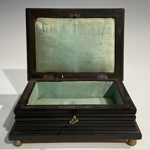 1675 - A 19th century rectangular ebonised and pietra dura table casket, the hinged cover set with a rectan... 