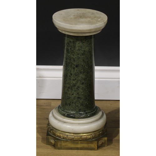 2450 - A French ormolu and marble mounted serpentine column, the turned circular plateau above a spreading ... 