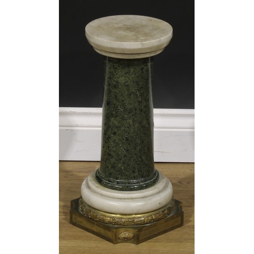 2450 - A French ormolu and marble mounted serpentine column, the turned circular plateau above a spreading ... 