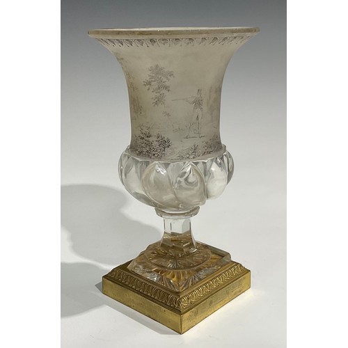 1562 - A 19th century French frosted and clear glass half spirally lobed campana shaped vase, decorated wit... 