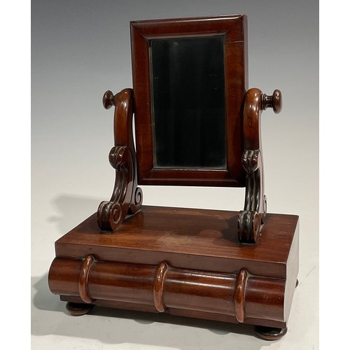 1930 - An unusually small Victorian mahogany dressing glass, rectangular tilting mirror plate flanked by sc... 