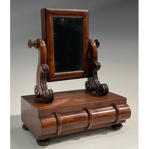 1930 - An unusually small Victorian mahogany dressing glass, rectangular tilting mirror plate flanked by sc... 