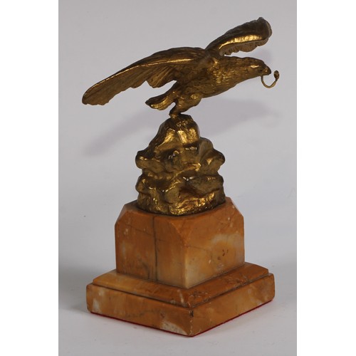 1669 - A 19th century gilt bronze and sienna marble pocket watch stand, cast as an eagle perched on a rocky... 