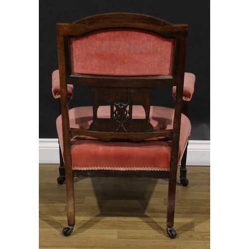 2597 - A Victorian rosewood and marquetry drawing room chair, arched back, stuffed-over upholstery, outline... 