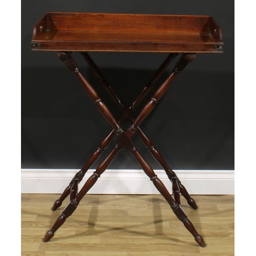 1623 - A 19th century mahogany butler’s serving tray on stand, 91.5cm high overall, the tray 9.5cm high, 76... 