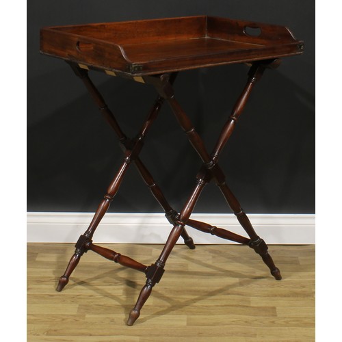 1623 - A 19th century mahogany butler’s serving tray on stand, 91.5cm high overall, the tray 9.5cm high, 76... 