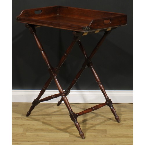 1623 - A 19th century mahogany butler’s serving tray on stand, 91.5cm high overall, the tray 9.5cm high, 76... 