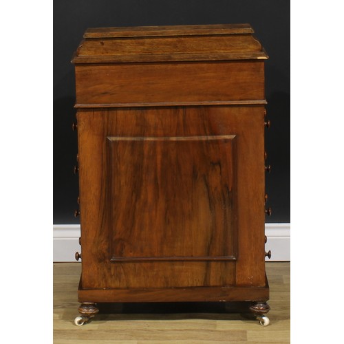 2283 - A Victorian walnut and marquetry Davenport desk, hinged superstructure enclosing stationery division... 