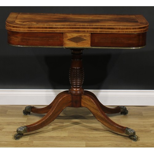 2355 - A Regency mahogany banded rosewood card table, hinged top enclosing a baize lined playing surface, t... 