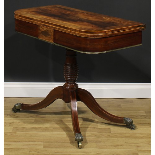 2355 - A Regency mahogany banded rosewood card table, hinged top enclosing a baize lined playing surface, t... 