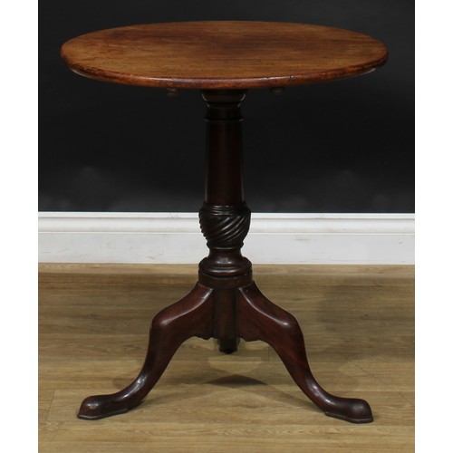 1936 - A George III mahogany tripod occasional table, circular tilting top, turned and wrythen-fluted colum... 