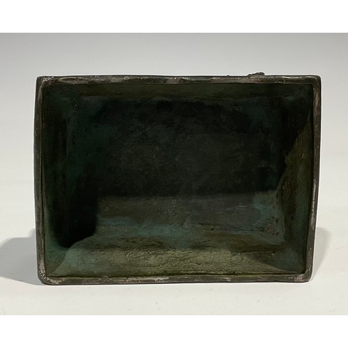 462 - Chinese School, a verdigris patinated bronze, of a temple guardian lion, rectangular base, 18.5cm hi... 