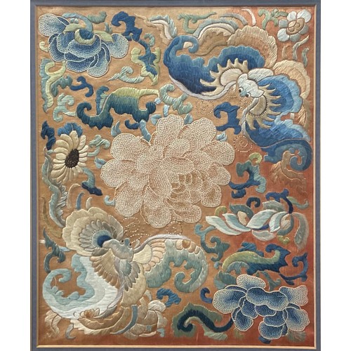 424 - A pair of Chinese embroidered silk panels, worked in coloured threads with bats, flowers and scrolls... 