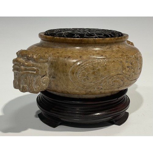 408 - A Chinese soapstone censer, carved in the Archaic taste, pierced hardwood cover, 18cm wide, hardwood... 