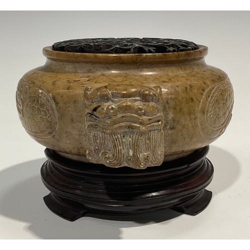 408 - A Chinese soapstone censer, carved in the Archaic taste, pierced hardwood cover, 18cm wide, hardwood... 