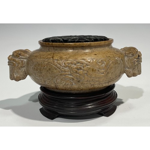 408 - A Chinese soapstone censer, carved in the Archaic taste, pierced hardwood cover, 18cm wide, hardwood... 