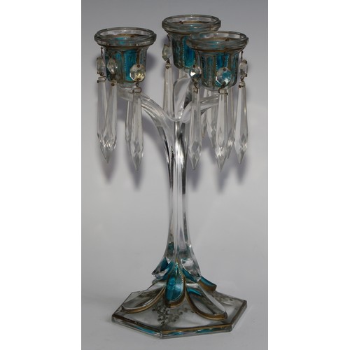 322 - A pair of 19th century pressed glass three-light candle lustres, with blue-flash panels picked out w... 