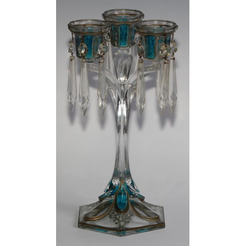 322 - A pair of 19th century pressed glass three-light candle lustres, with blue-flash panels picked out w... 