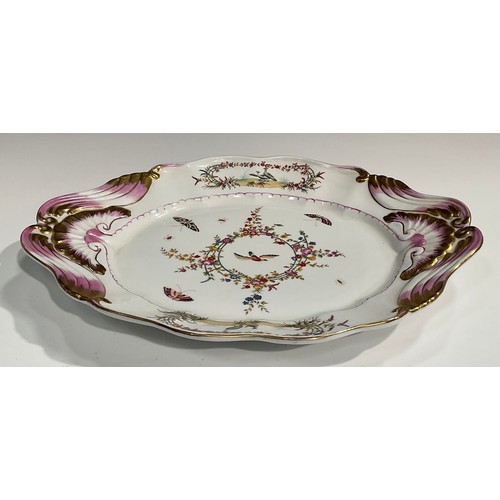 306 - A porcelain fluted oval tureen, cover and stand, decorated in polychrome with birds, inscets and flo... 