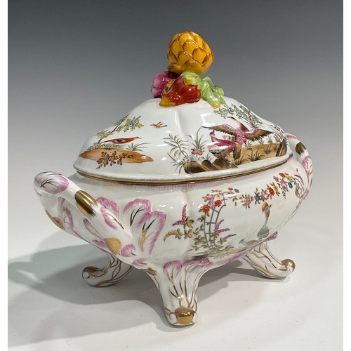 306 - A porcelain fluted oval tureen, cover and stand, decorated in polychrome with birds, inscets and flo... 