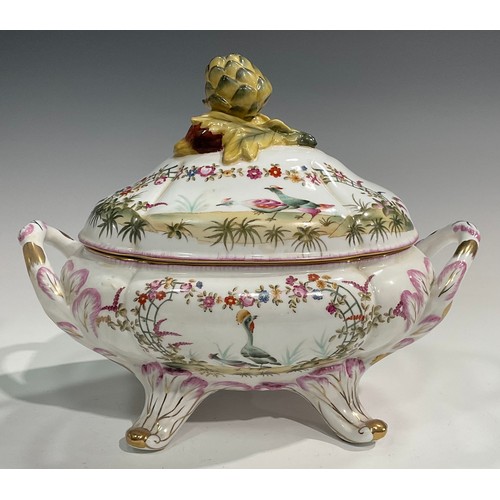 303 - A pair of porcelain fluted oval tureens and covers decorated in polychrome with birds and flowers, p... 