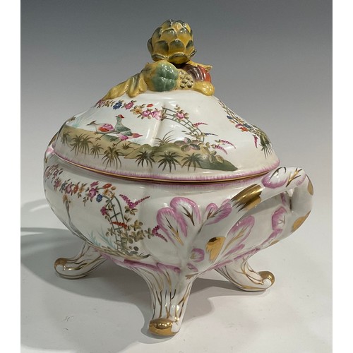 303 - A pair of porcelain fluted oval tureens and covers decorated in polychrome with birds and flowers, p... 