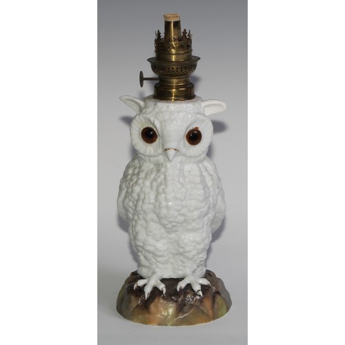 287 - A Continental porcelain novelty oil lamp, as an owl, 33cm high overall, c.1900