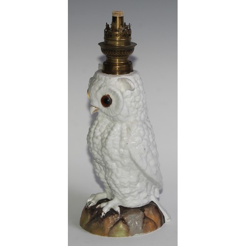 287 - A Continental porcelain novelty oil lamp, as an owl, 33cm high overall, c.1900