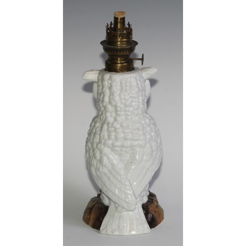 287 - A Continental porcelain novelty oil lamp, as an owl, 33cm high overall, c.1900