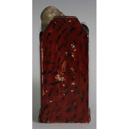 100 - A Staffordshire Vicar and Moses group, typically modelled and coloured in polychrome, 26cm high, c.1... 