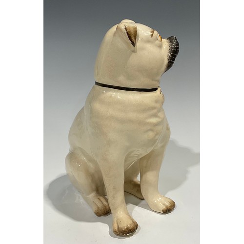 96 - A pair of 19th century Staffordshire models of pugs, seated to left and right, painted features, 28c... 