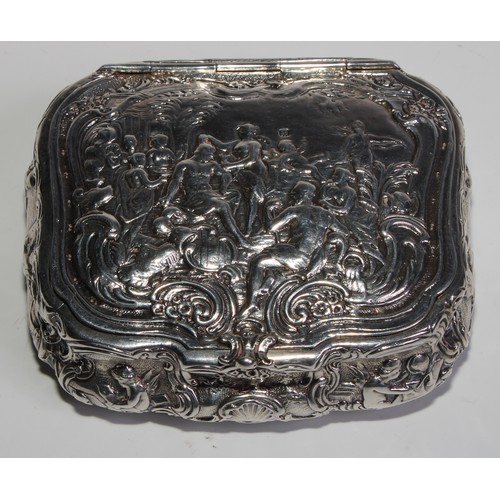 999 - A late 19th centuruy Dutch cast silver bombe shaped table snuff box, hinged cover in relief with a s... 