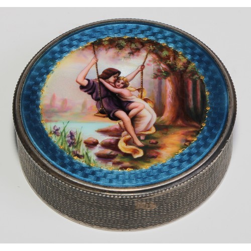 871 - A Continental silver and enamel circular snuff box, hinged cover decorated in polychrome with a cour... 