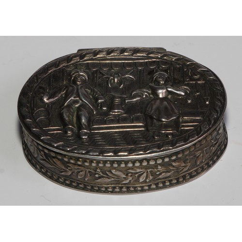 984 - A German silver oval snuff box, hinged cover embossed with a couple revelling, 4.5cm wide, halbmond ... 