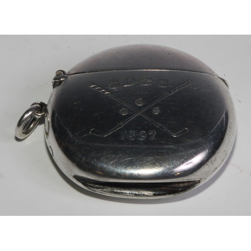 1209 - Golf - a Victorian silver novelty vesta case, engraved with crossed clubs and golf balls, hinged cov... 