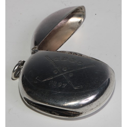 1209 - Golf - a Victorian silver novelty vesta case, engraved with crossed clubs and golf balls, hinged cov... 